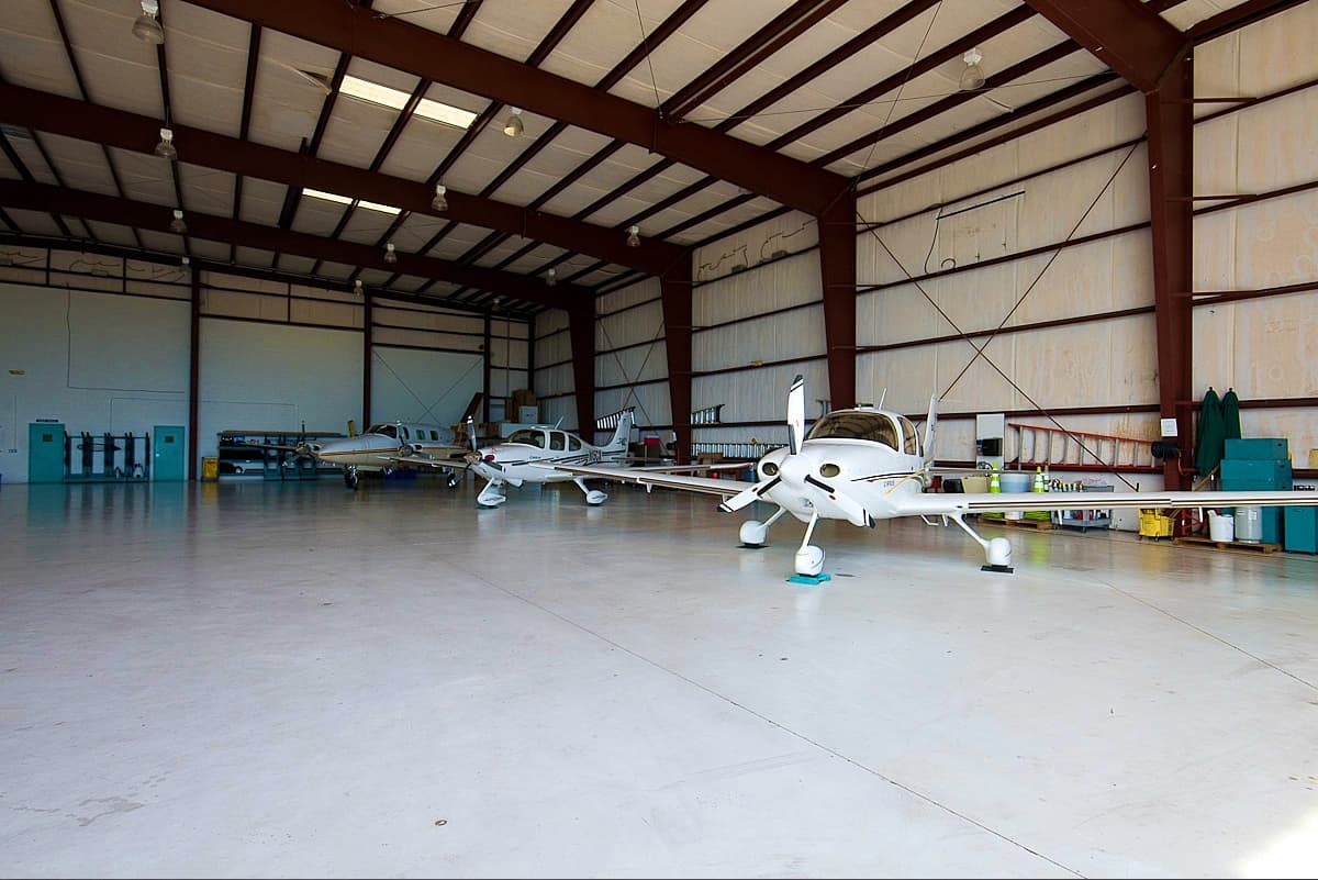 Airplanes parked in hangar