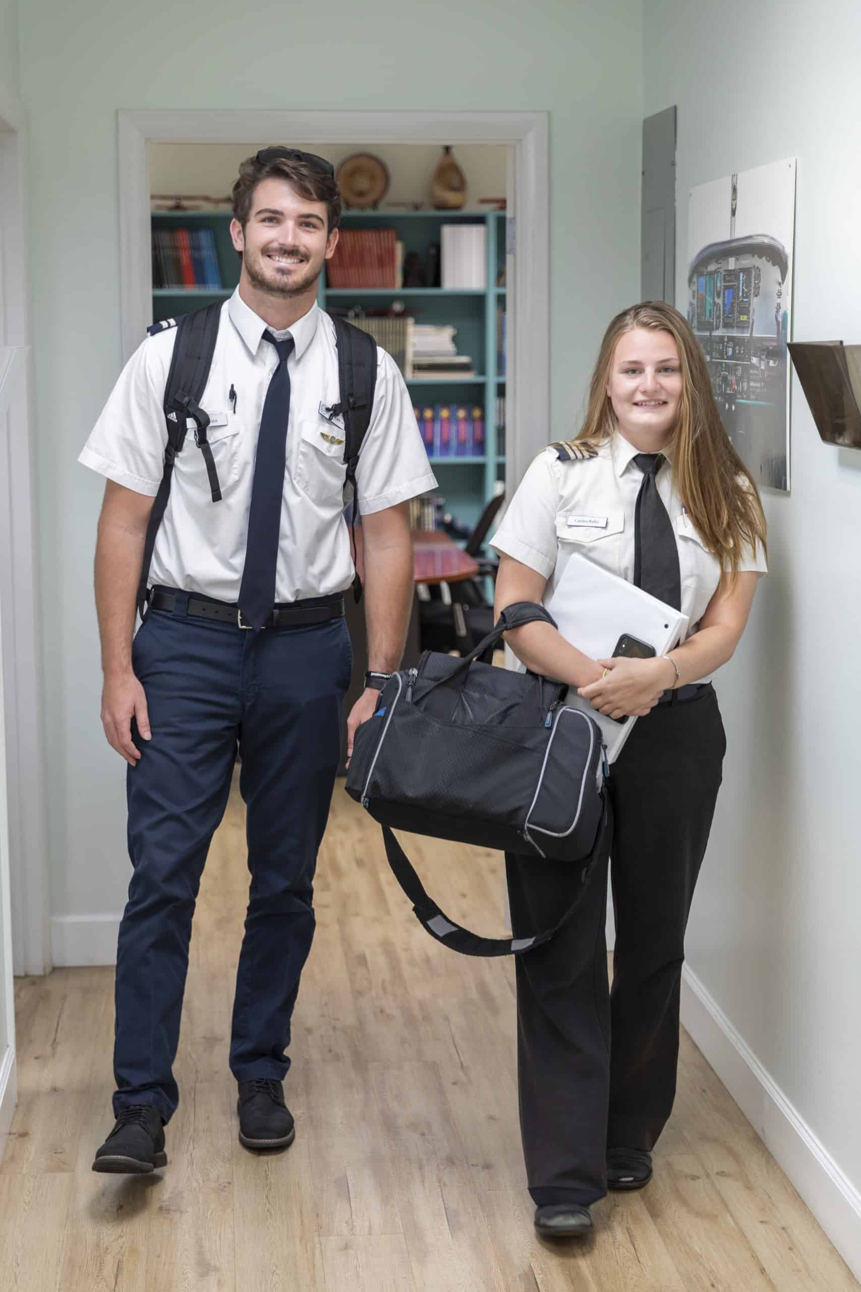 Two Paris Air flight students walking together and smiling