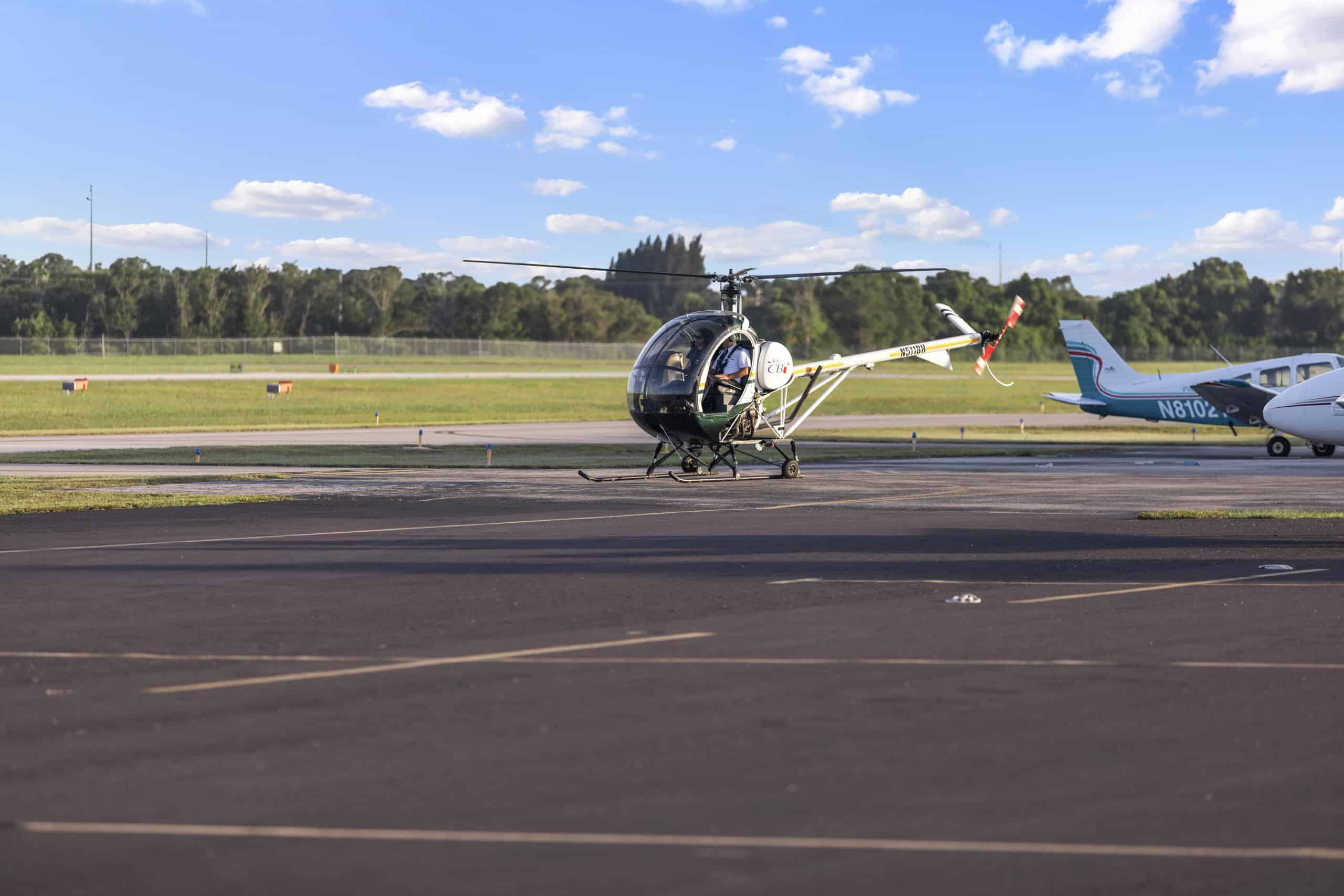 Photo of a helicopter landing on the tarmac
