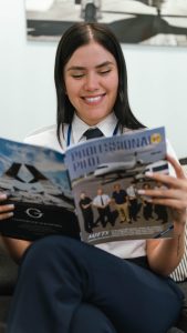 student reading aviation magazine